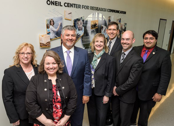 ONEIL Center for Research Communication opens at Wright State University. Brandy Foster, executive director of the ONEIL Center for Research Communication is pictured second from left. (Photo by Erin Pence)