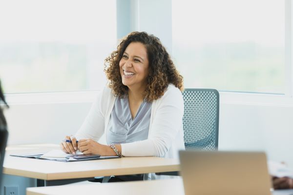 Higher Ed professional showing commitment to lifelong learning by taking a class