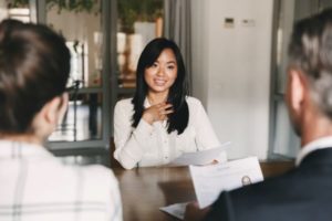 Hiring Process: A candidate being interviewed by a hiring comittee