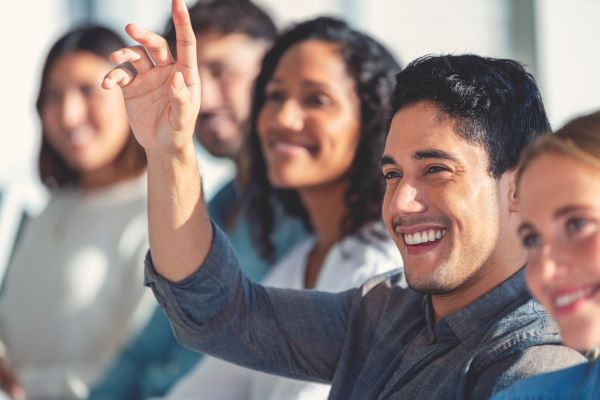 Group of higher ed employees engaged at work meeting