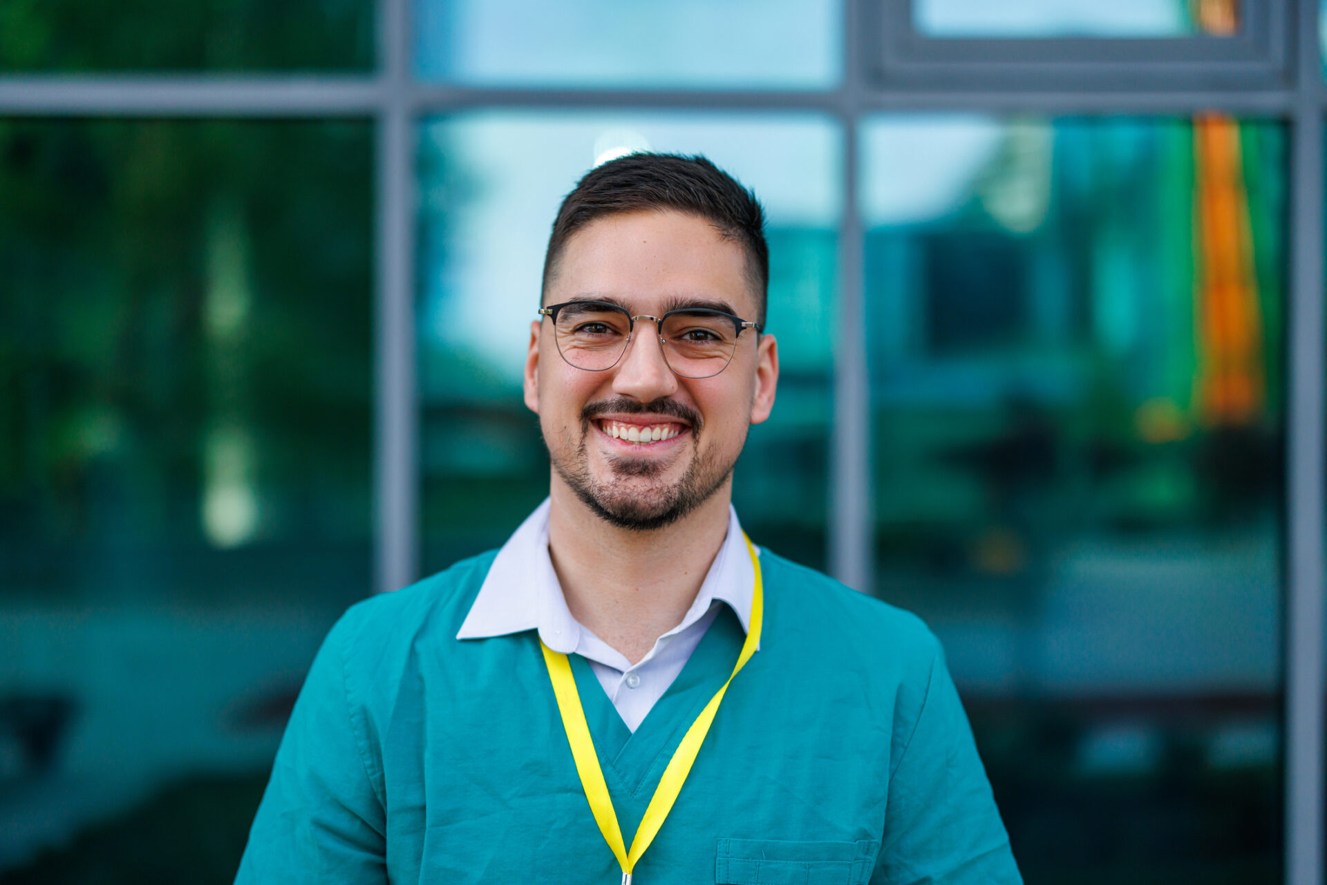 Healthcare higher ed professional smiling at camera