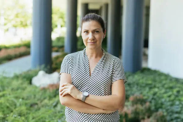 Gaining Visibility: Professional woman smiling confidently