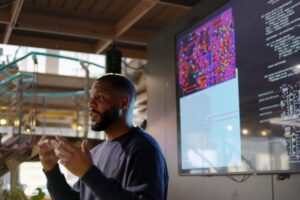 A professor conducts a lecture on AI in higher education