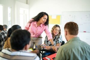 From Adjust to Full Time Faculy: A faculty member discusses a problem with a group of students