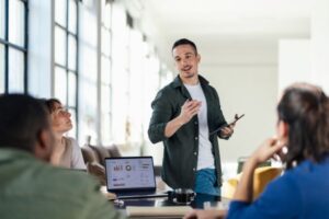 Engaging Meetings: Small team having a meeting to share news and updates