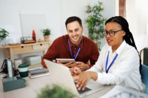 Higher ed tech professionals discussing a tech solution